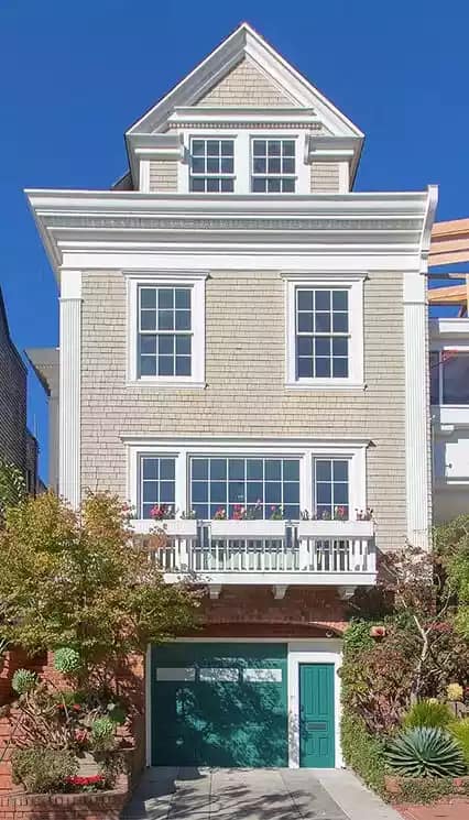 Tan colored cedar shake siding home sold fast in West Long Branch.
